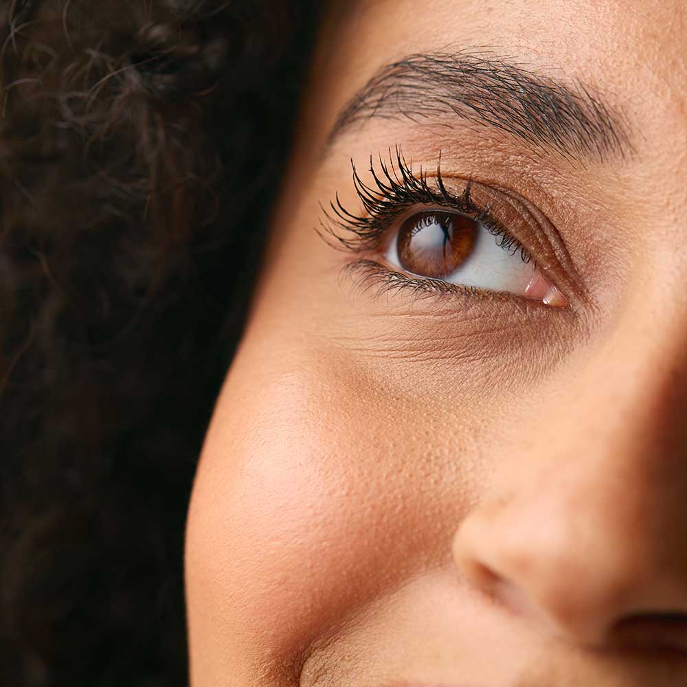 woman looking up and smiling